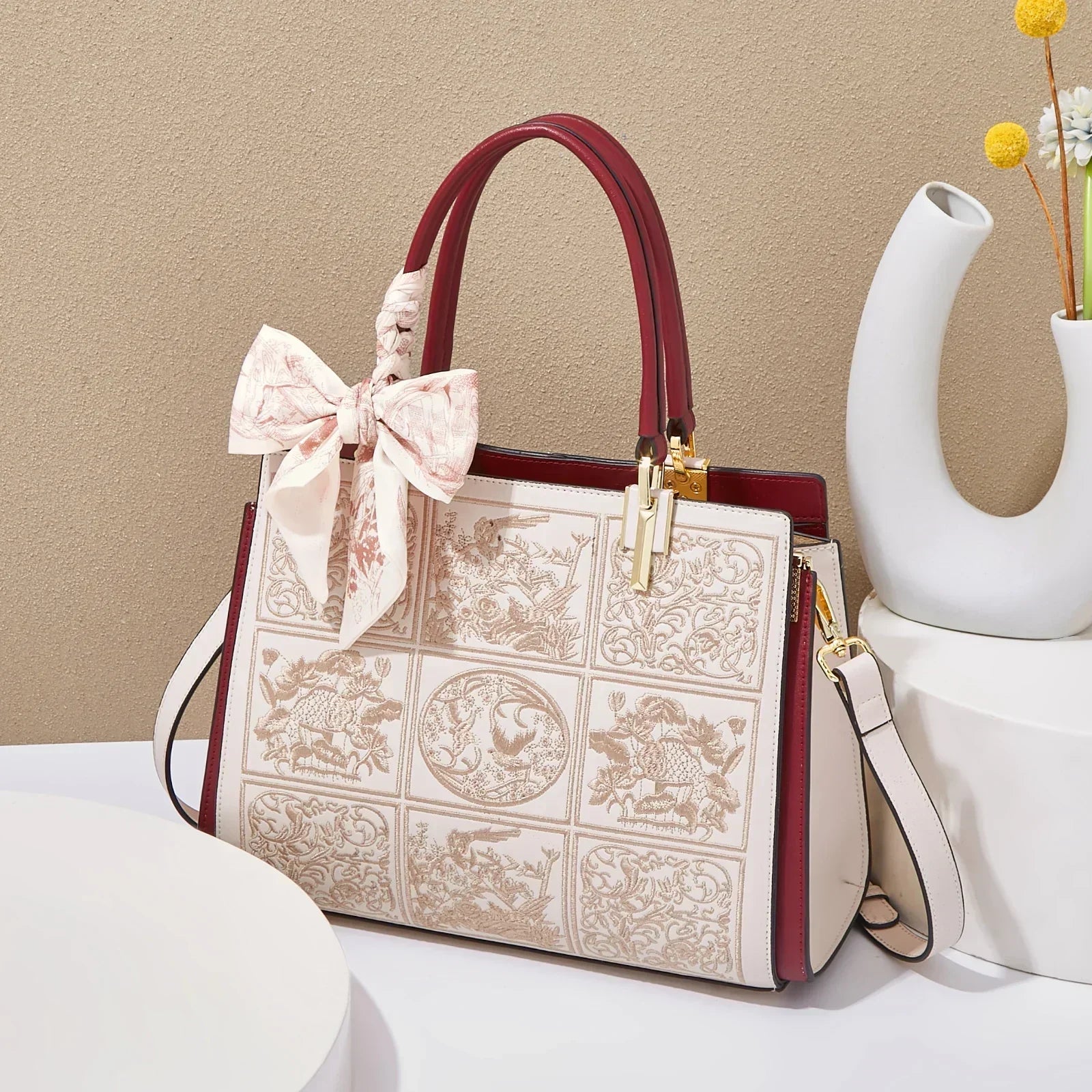 sylvia™ – unik crossbody med broderi og sløjfedetalje